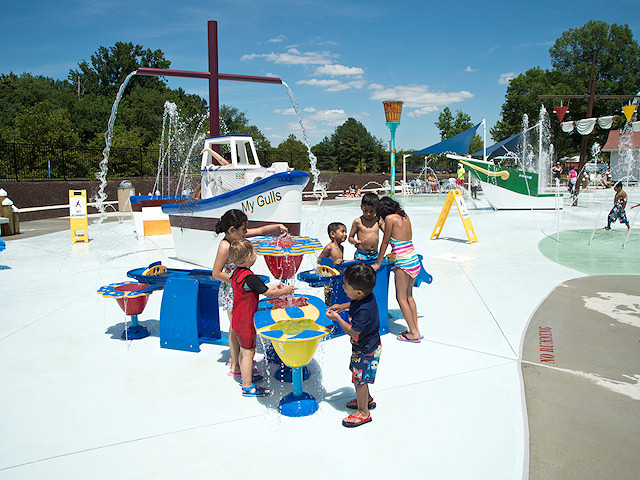 Children playing in the water at the sprayground