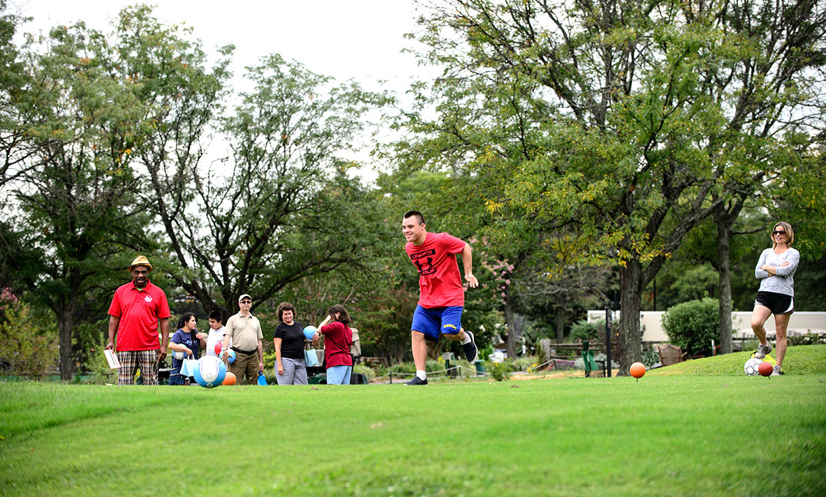 people playing soccer in soccer field