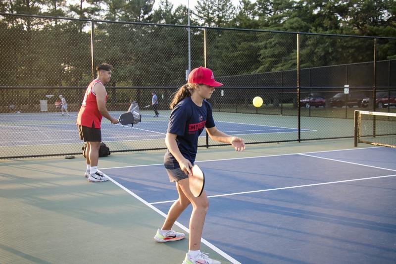 image of people playing pickleball