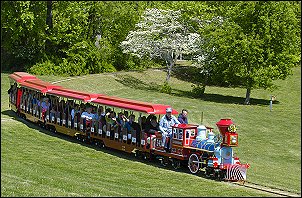 A new locomotive pulls refurbished passenger cars at Burke Lake Park!