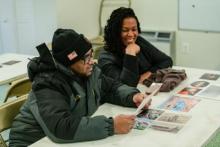 two people looking at files two people looking at files