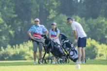 people playing golf