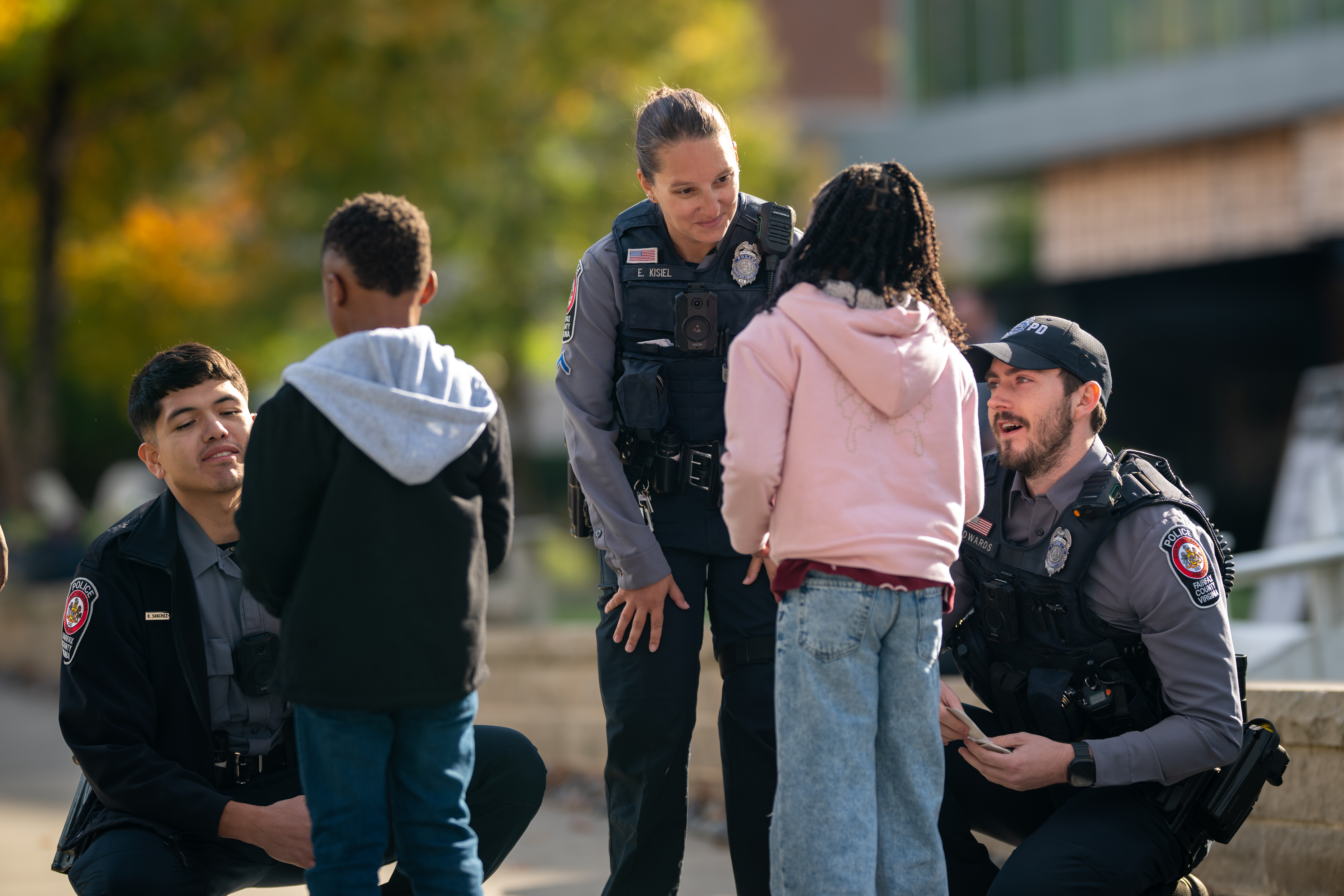 FCPD officers engaging with children outside