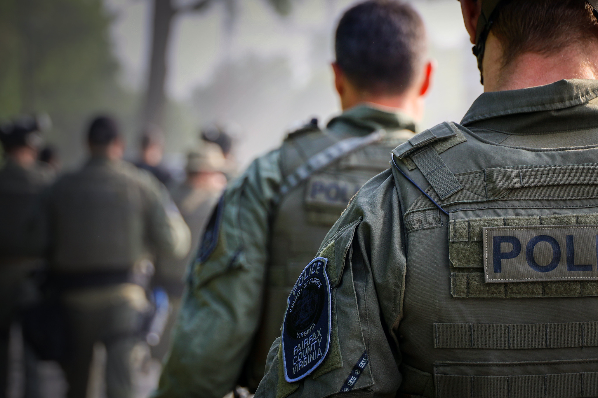 FCPD SWAT officers in olive tactical uniforms with Fairfax County Police patches
