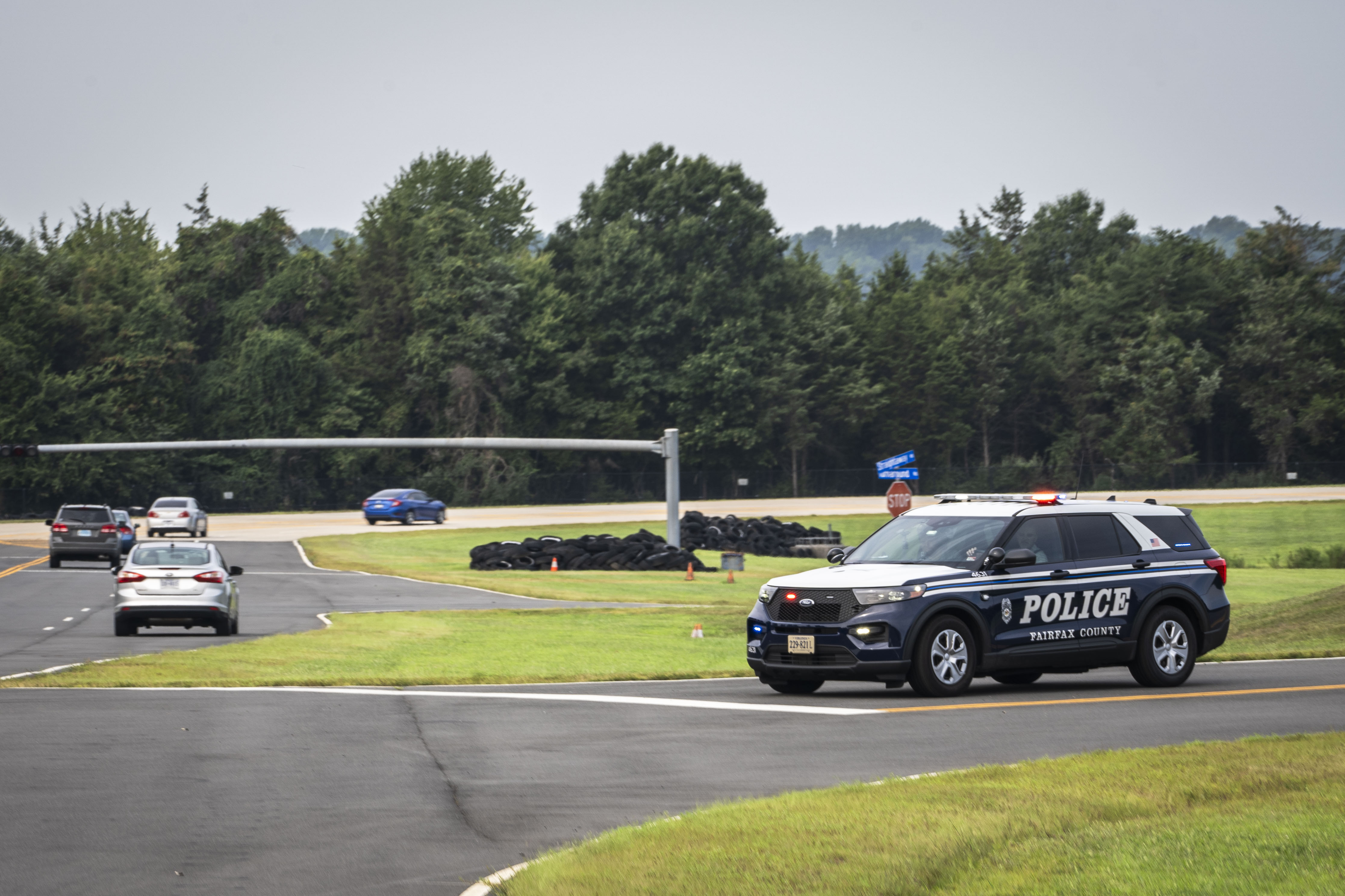 FCPD cruiser along with normal cars on a closed course track