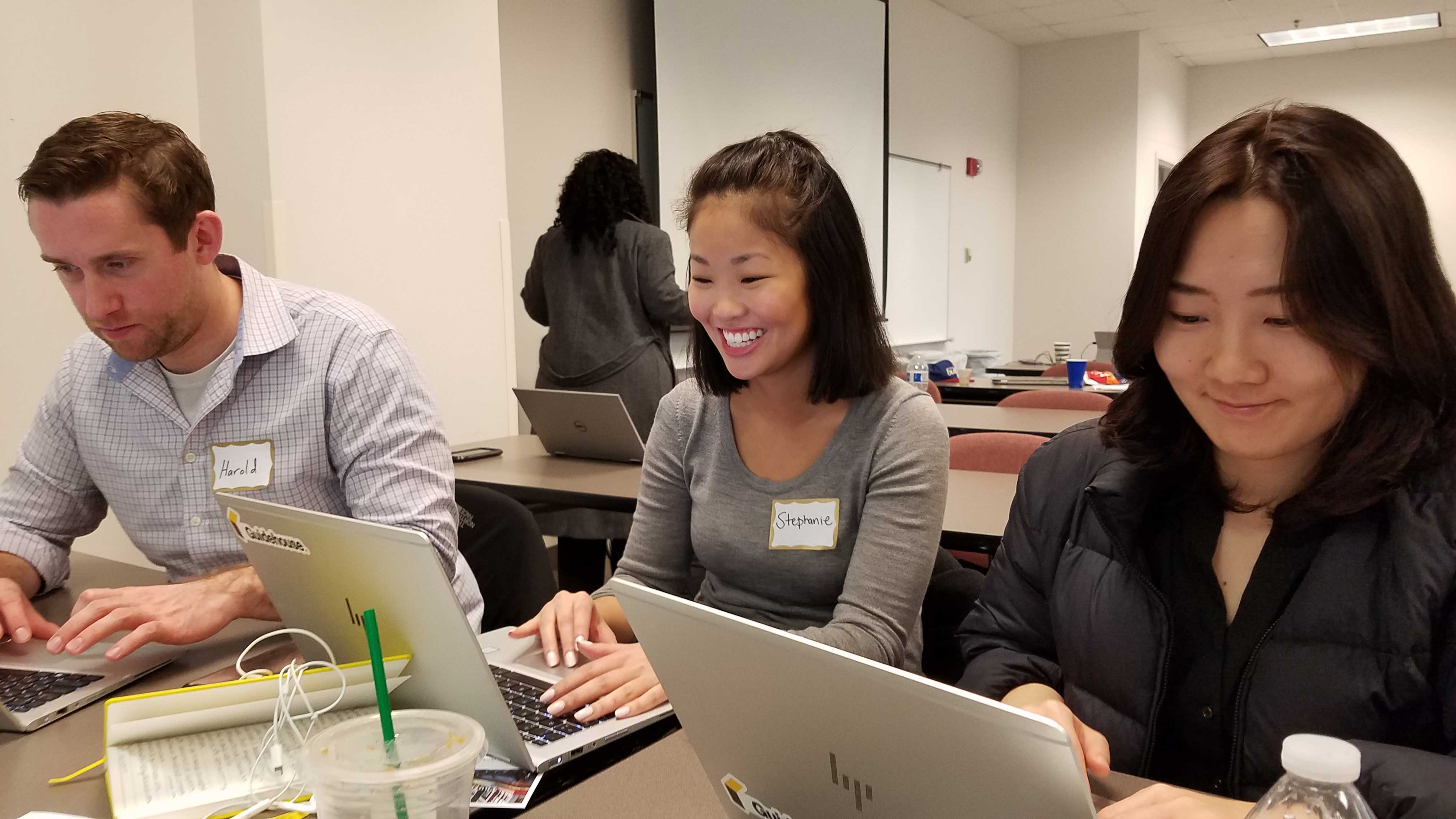 Housing hackathon participants at work.