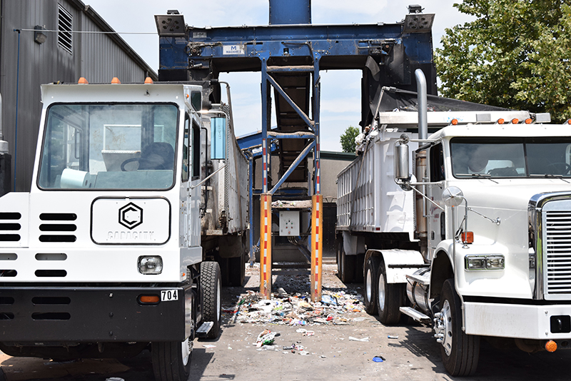 Unrecyclable Waste is Trucked to a Landfill