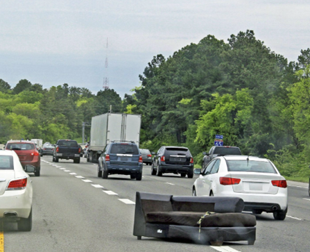 fallen sofa on roadway