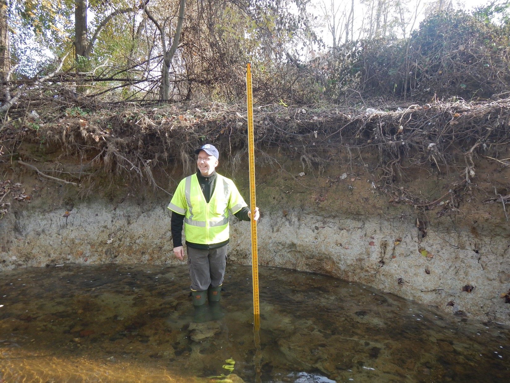 Severe erosion has resulted in vertical banks approximately 7 feet high. 