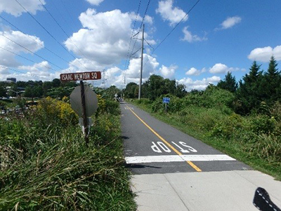 W&OD trail embankment with flooding area on left