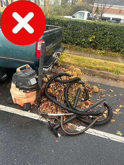 Unacceptable - Trash in Leaf Pile