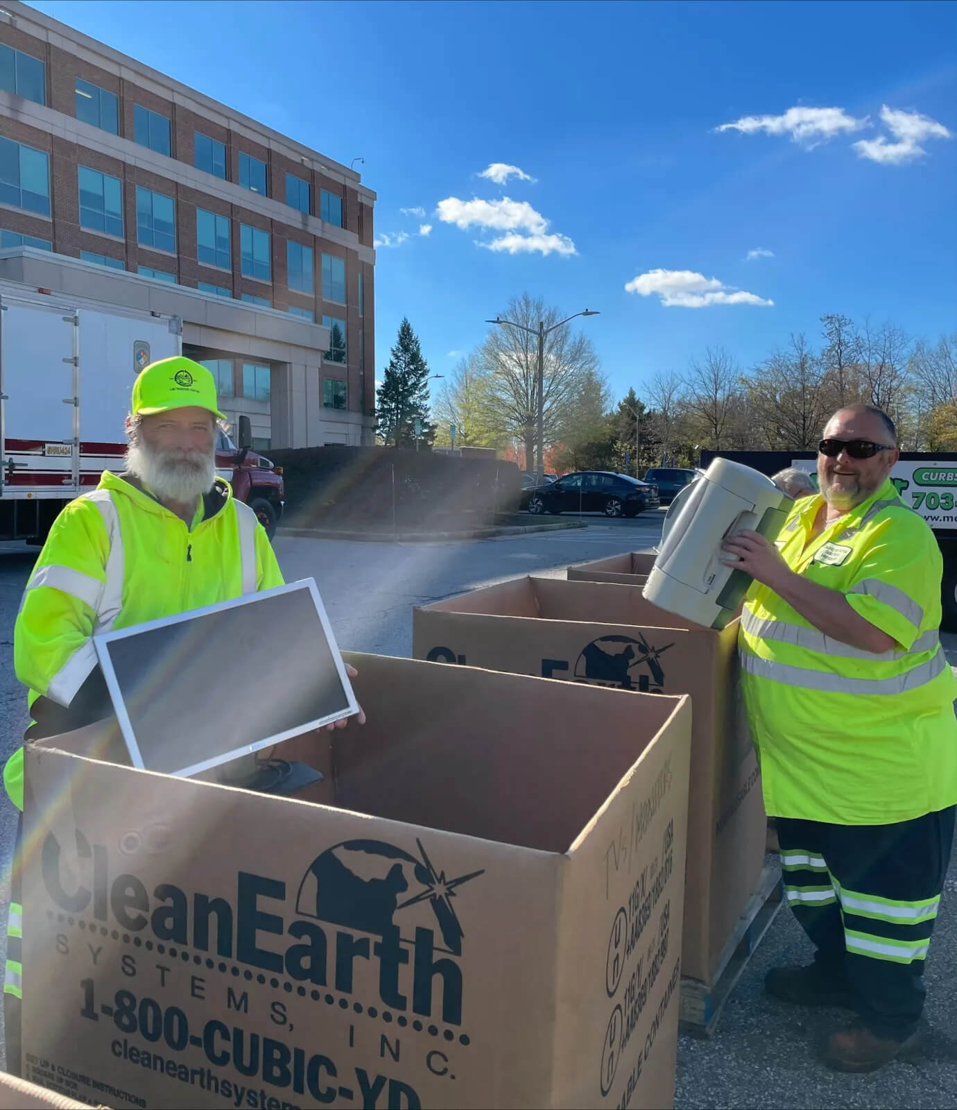 Staff loading e-waste