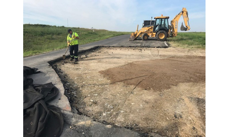 Old asphalt is removed before a mix of recycled materials is used to repair the road.