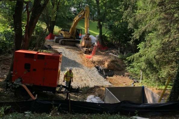 Emergency construction to repair a broken sanitary sewer line 