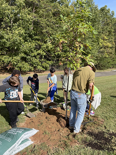 Students at Liberty Middle School tree planting