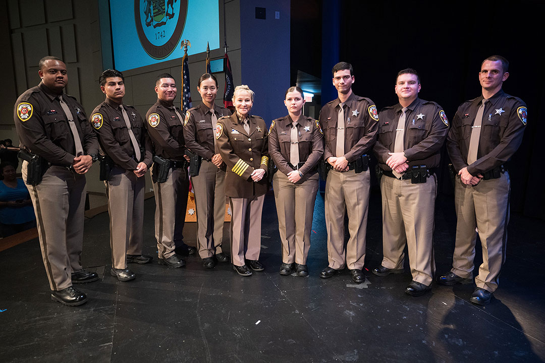 Session 89 graduates with Sheriff Stacey Kindcaid.