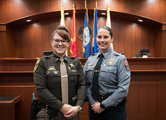 Fairfax County Sheriff’s Deputy 2nd Lt. Jennifer Foster and Fairfax County Police Officer Capt. Christina Burrow together developed the first Veterans in Crisis: Advanced Training for Law Enforcement course. 