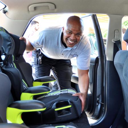 Deputy checks two safety seats in van