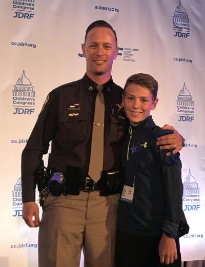 Chris Loftis and boy at JDRF Children's Congress