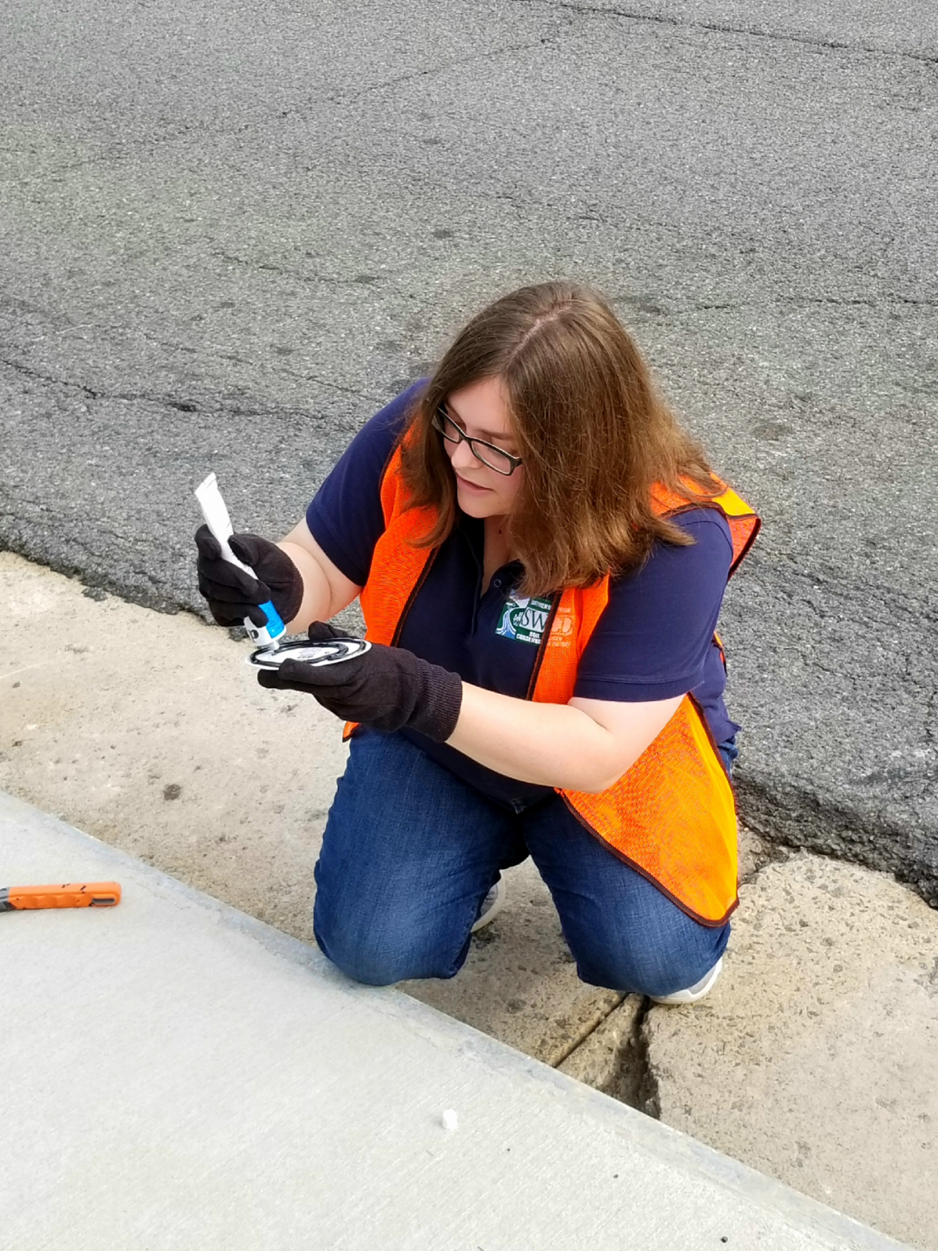 Ashley labels a drain as an example. 