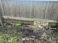 fence obstructing overland flow