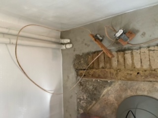 Photo of a sub-slab drainage system installation