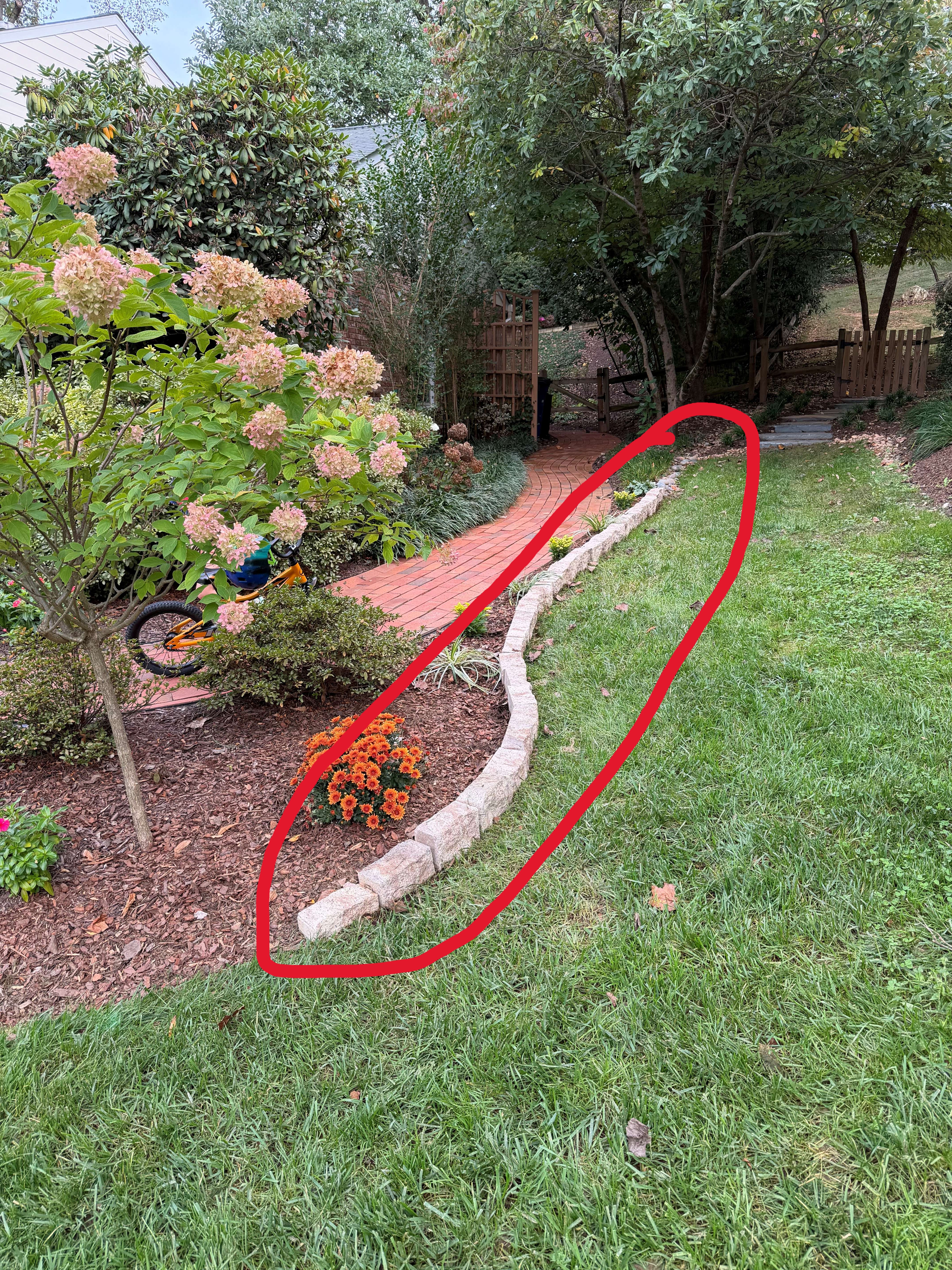small brick wall in yard