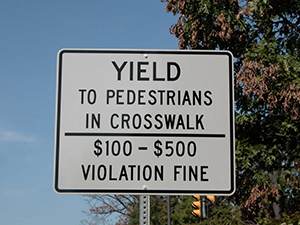 Yield to Pedestrians Sign
